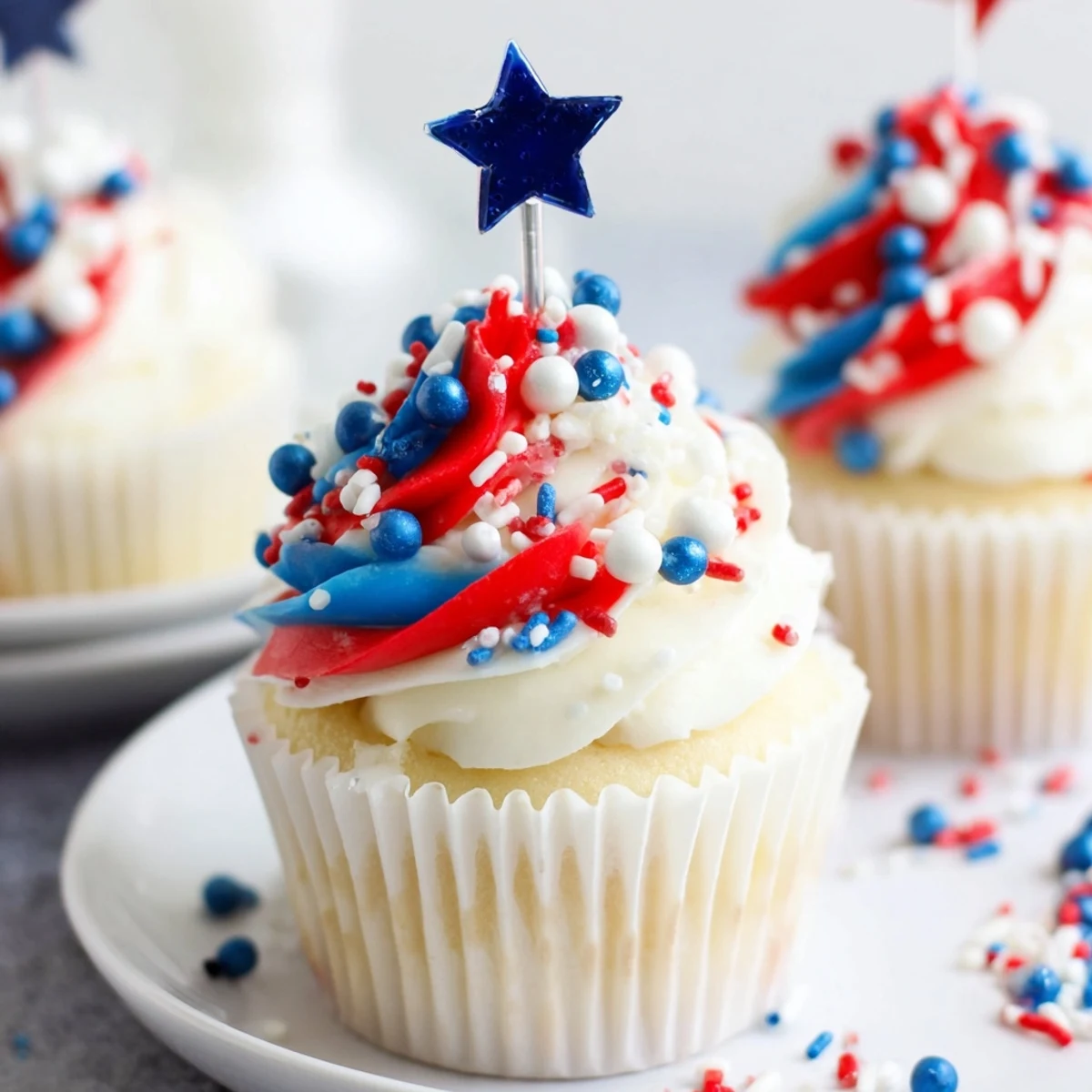 Close-up of Patriotic Firework Cupcakes piped with fluffy buttercream, perfect picnic dessert