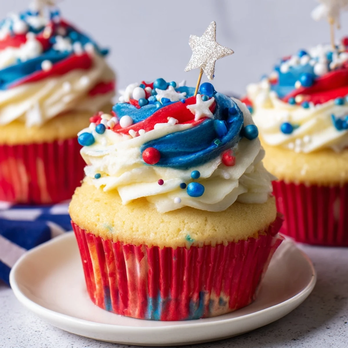 Tray of Patriotic Firework Cupcakes ready for Fourth of July, bright aroma