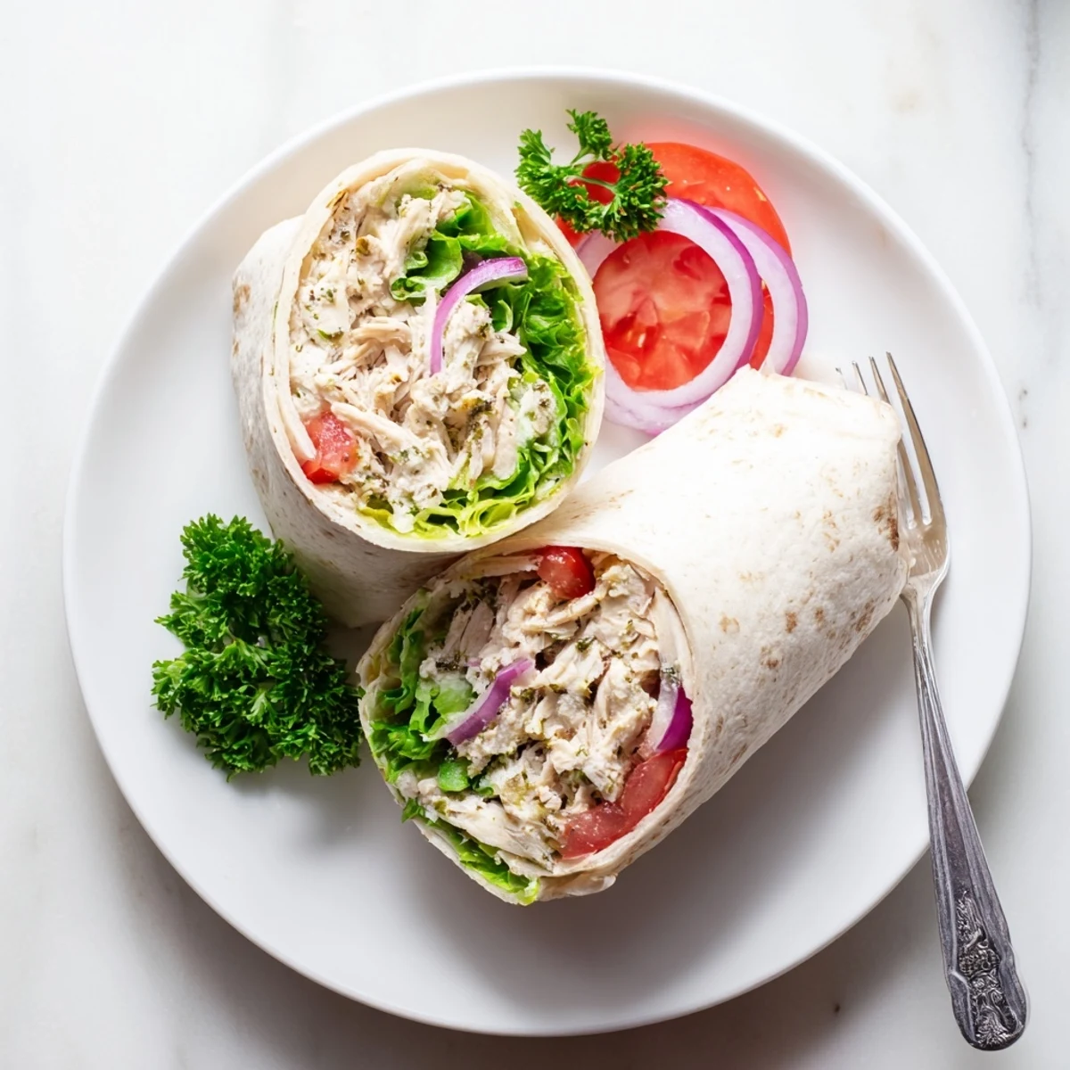 Protein-packed cottage cheese flatbread chicken wraps featuring golden crispy flatbread topped with seasoned shredded chicken and crisp vegetables