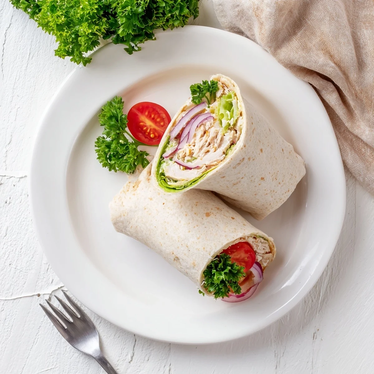 Crispy cottage cheese flatbread wraps filled with spiced chicken, fresh tomatoes, and crunchy red onion slices